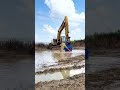 The excavator is equipped with #ExcavatorMulchPump #SandPits #MulchTreatment #RiverCleaning