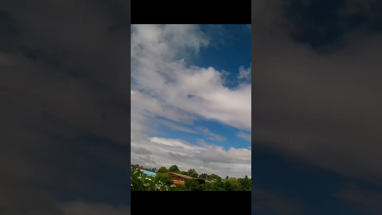 Clouds flowing behind our home 