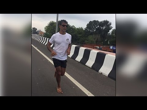 Milind Soman running barefoot from Ahmedabad to Mumbai, Know why| Oneindia News