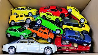 Фото Box Full Of Various Miniature Cars Peugeot, Hyundai, Mazda, Honda, Jaguar, Opel, Bugatti, Volvo #23