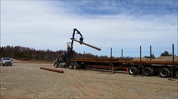 Unloading New Power Line Poles