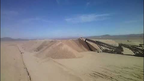 TS Radial Telescopic and 7 x Mobile Link Conveyors Stockpiling in Heap Leaching Application