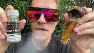 Smoking Dokha Out Of A Glass Pipe For The First Time