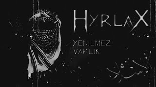 Kamos Xhex Adlı Türeme Tekdar Hyrlax Tarafından Baş Aşşağı Sına Asılıyor.