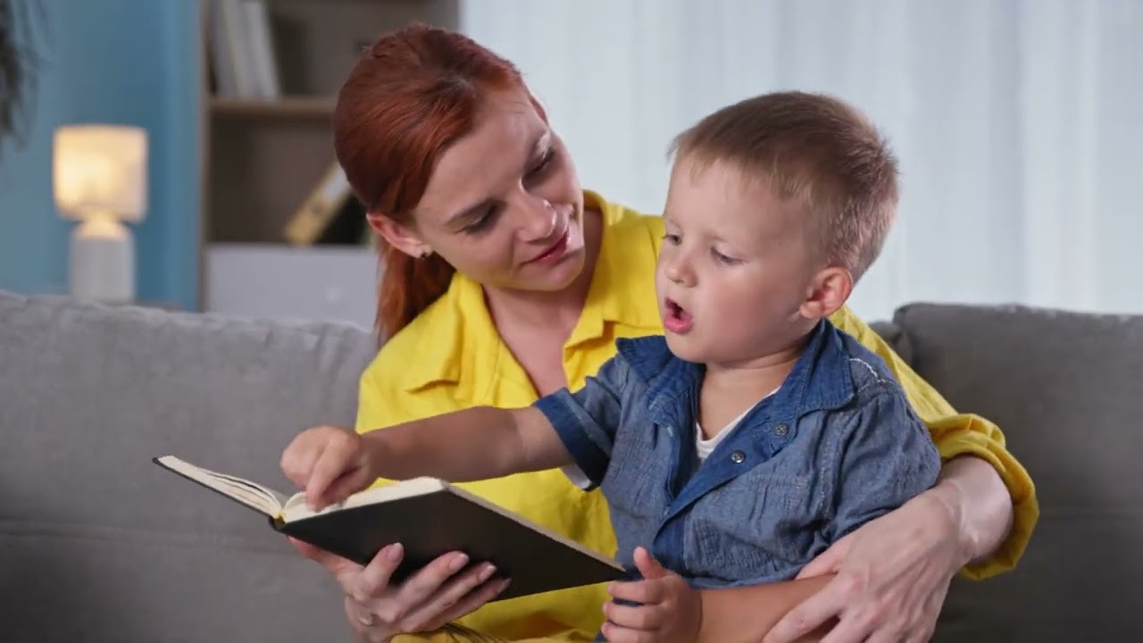 Video preview image of A woman and child looking at a book together ; click to visit the ParentSquare post with the video