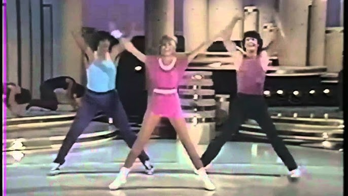 Olivia Newton John (Let's Get Physical), workout clothes and leg warmersso  1980s