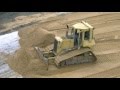 Cat D4H LGP spreading sand part 1