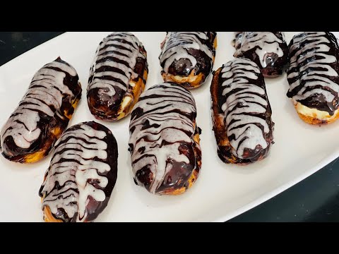 Video: Eclairs With Cream In Chocolate Glaze