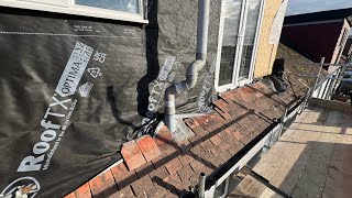 Removing Old Tiles From The Loft