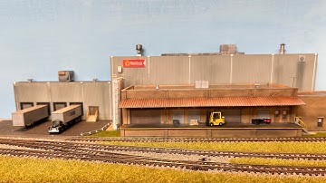 N scale switching layout build Part 12: details around the bakery and ballasting a turnout.