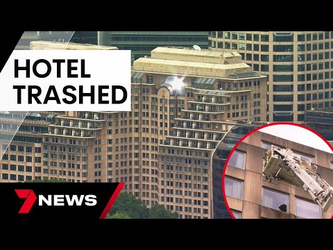 Man under police guard after trashing luxury hotel room | 7 News Australia