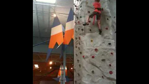 Brandon climbs the rock wall