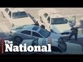 Toronto police open fire on car