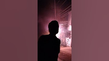 Electric Pole Catches Fire in the Street at Night