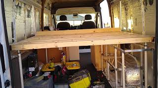 Powered toy hauler van bed