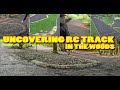 Uncovering abandoned race track in woods