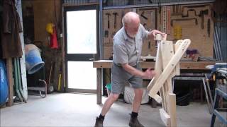 A folding shave horse loosely built on the "shave mule" plans available at: https://www.popularwoodworking.com/american-