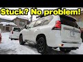 4x4 Rescue: Towing a Stuck Car in Snow with a Land Cruiser Prado