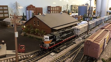 My 4x8x2 HO Layout - 4 Trains Run by JMRI Script Successful