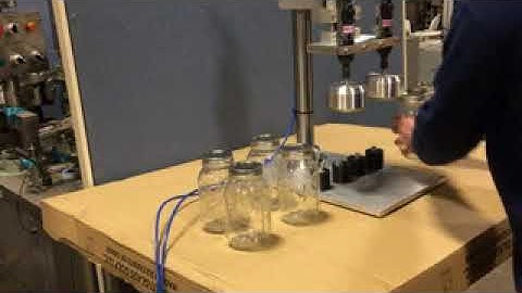 BID ON EQUIPMENT: Item 335462 - Dual-Head Bottle Capping Machine/Cap Tightener