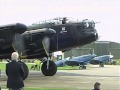 An Avro Lancaster starts up, taxis out, takes off and does a flyby