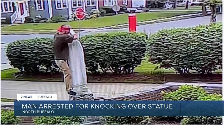 Man arrested for hate crime after video allegedly shows him knocking over church statue in Buffalo