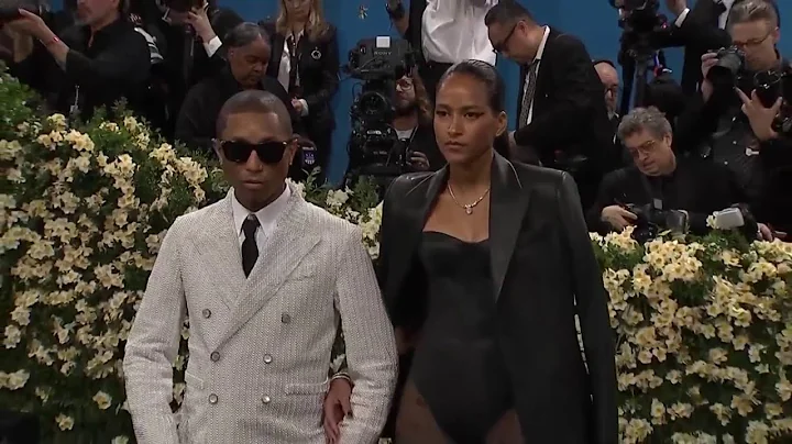 Pharrell Williams & Helen Lasichanh arrive at the Met Gala