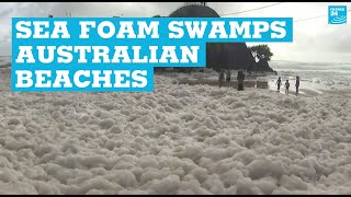 Sea foam swamps Australian beaches