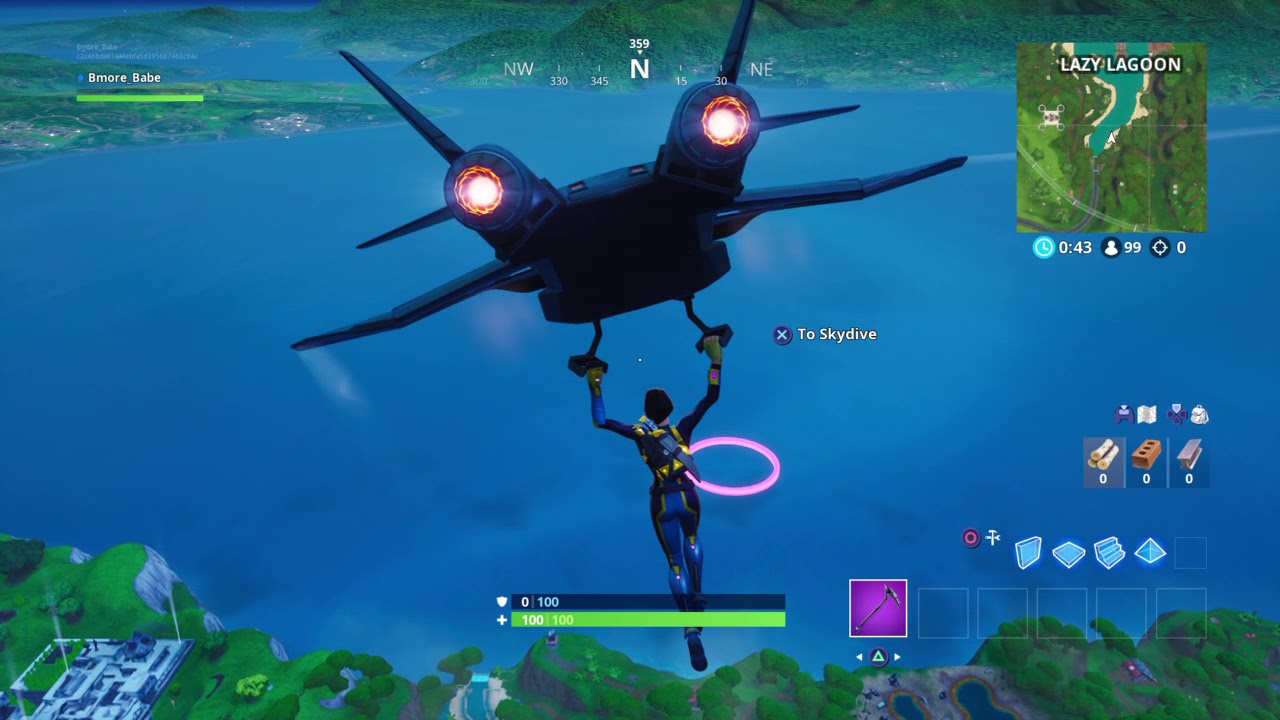 Fortbyte #70 Location Accessible By Skydiving Through Rings Above Lazy Lagoon with Vibrant Contrail