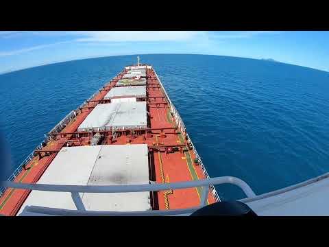 How the ship receiving and leaving pilot helicopter at Hay Point Australia