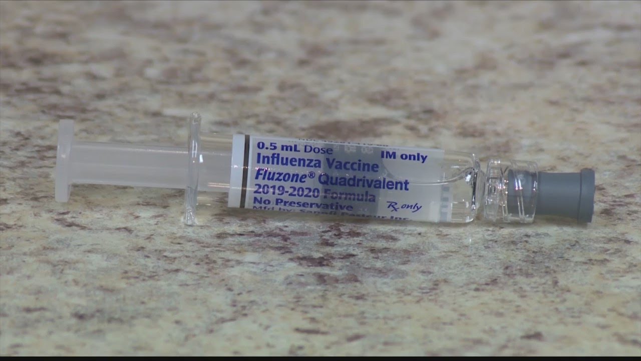 School officials urge parents to look for flu warning signs