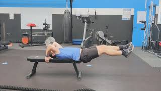 Reverse crunch with leg extensions