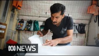 Up-cycling refugee boats into bags | ABC News