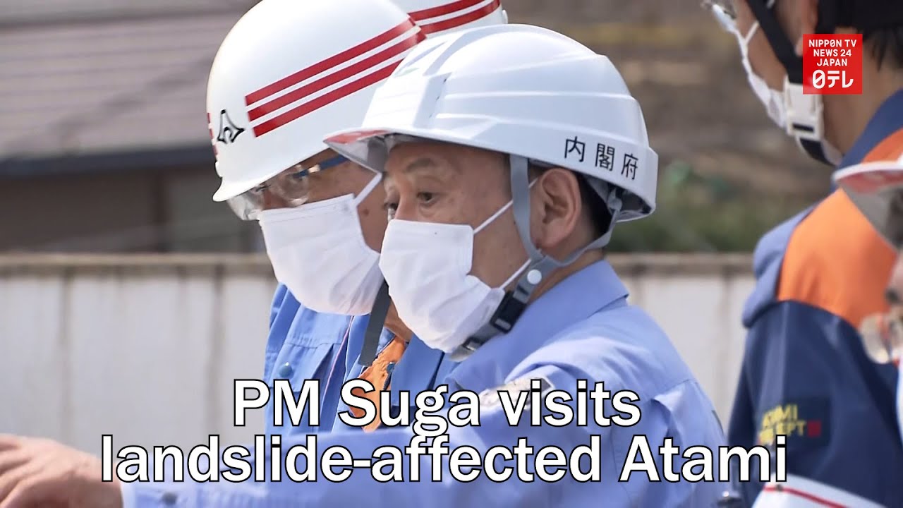PM Suga visits landslide affected Atami