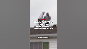 Two men appear to wait out Border Patrol agents on roof