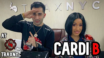 What CARDI B picks up at TraxNYC?