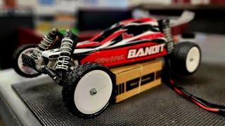Can a Brushed Traxxas Bandit hang on a turf track??