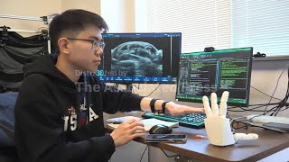 Engineers build AI-powered ultrasound wristband that enables realtime control of robotic hands, VR