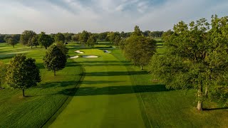 An aerial view of the first hole on west course at winged foot golf
club, host site 2020 u.s. open championship. opening is a slight
dogl...