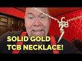 A solid gold TCB Necklace from Elvis' Personal Jewler Lowell Hays!