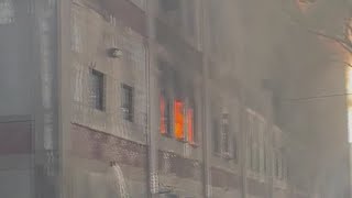 NJ warehouse fire contained over 24 hours later