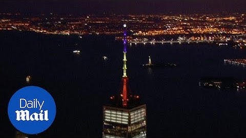 One World Trade Center lights up for Belgium after attacks - Daily Mail