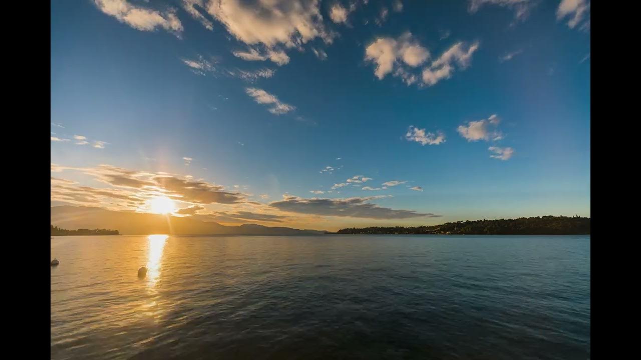 From Night To Sunrise Time Lapse At The Beautiful Lake Garda Salo from-night-to-sunrise-time-lapse-at-the-beautiful-lake-garda-salo