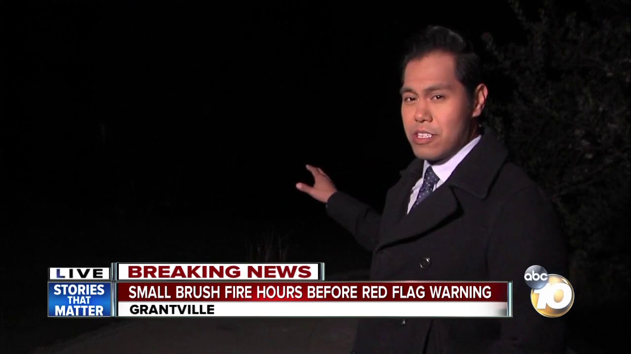 Brush fire breaks out during red flag warning - YouTube