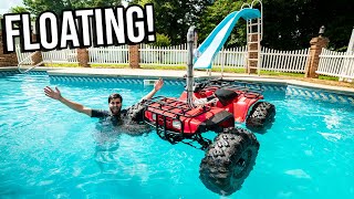 FLOATING FOUR-WHEELER IN POOL