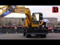 French Dancer Performs Ballet with Excavator