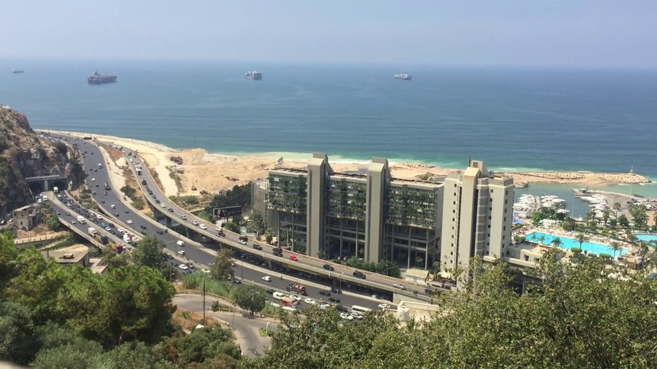 An Urbanized Sea Bay Developments, With Man Made Structures · Free Stock Video