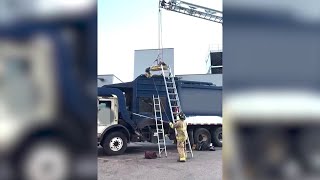 Crews Rescue Man From Inside Of Garbage Truck - The Sprint