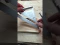 Quickly find the center of a board using a speed square shorts diy diytips woodworkingtips