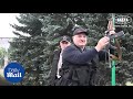 Belarus: President Alexander Lukashenko carries RIFLE as protesters demand his resignation